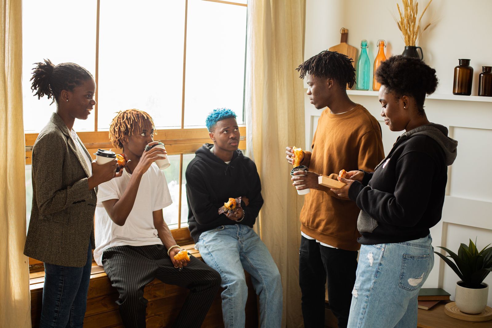 Friends sharing a conversation indoors